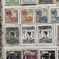 Lot de timbres néerlandais des Indes néerlandaises de 1870 à 1942 sur une page d'album, ensembles courts, surcharges